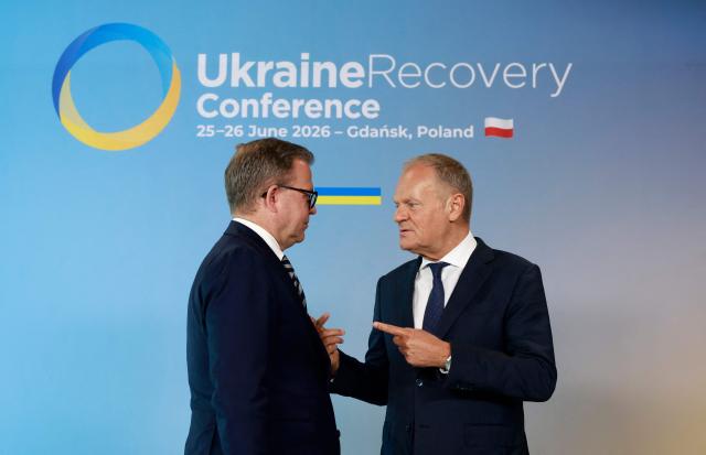 Polish Prime Minister Donald Tusk (R) welcomes Finnish Prime Minister Petteri Orpo as he arrives to attend the Ukraine Recovery Conference (URC 2026) in Gdansk, Poland, on June 25, 2026. The Ukraine Recovery Conference (URC 2026), co-hosted by Poland and Ukraine, takes place in Gdansk on June 25–26, 2026, aiming to strengthen support for Ukraine’s reconstruction and boost investment, with a focus on energy, critical infrastructure, and logistics sectors. (Photo by Wojtek RADWANSKI / AFP)