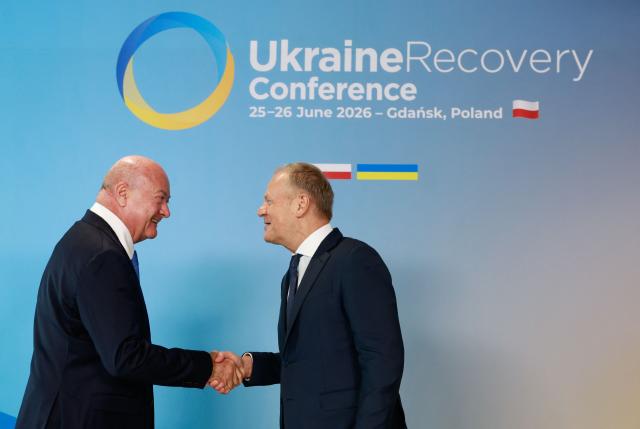 Polish Prime Minister Donald Tusk (R) welcomes Austrian Chancellor Christian Stocker as he arrives to attend the Ukraine Recovery Conference (URC 2026) in Gdansk, Poland, on June 25, 2026. The Ukraine Recovery Conference (URC 2026), co-hosted by Poland and Ukraine, takes place in Gdansk on June 25–26, 2026, aiming to strengthen support for Ukraine’s reconstruction and boost investment, with a focus on energy, critical infrastructure, and logistics sectors. (Photo by Wojtek RADWANSKI / AFP)