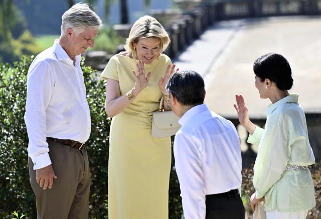 Japan's Emperor Naruhito (2nd R) and Japan's Empress Masako (R) speak with King Philippe of Belgium (L) and Queen Mathilde of Belgium (2nd L) during a visit to the Royal Greenhouses and the Japanese Tower in Brussels on June 25, 2026 as part of an official state visit of the Japanese Emperor and Empress to Belgium. (Photo by ERIC LALMAND / Belga / AFP) / Belgium OUT