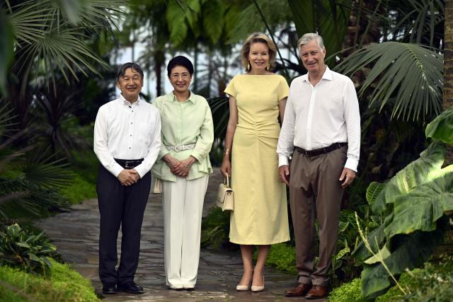 Japan's Emperor Naruhito (L) and Japan's Empress Masako (2nd L) pose alongside King Philippe of Belgium (R) and Queen Mathilde of Belgium (2nd R) during a visit to the Royal Greenhouses and the Japanese Tower in Brussels on June 25, 2026 as part of an official state visit of the Japanese Emperor and Empress to Belgium. (Photo by ERIC LALMAND / Belga / AFP) / Belgium OUT