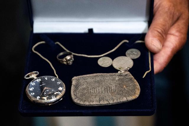This photograph taken on June 25, 2026 shows Dimitris Vafeiadis' personal belongings during a ceremony for the return of personal belongings of Greek prisoners from Nazi forced labor camps to their families, held as part of the international StolenMemory campaign, at the Ministry of Foreign Affairs in Athens on June 25, 2026. (Photo by Angelos TZORTZINIS / AFP)
