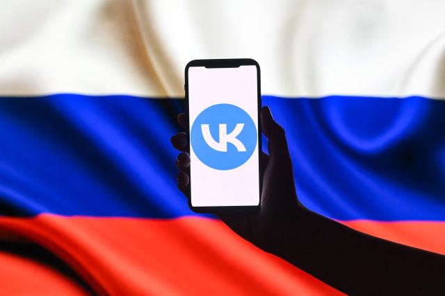 This illustration photograph shows the logo of Russian social media platform VK displayed on a smartphone in Moscow on June 25, 2026. Apple has removed VKontakte, one of Russia's largest social networks, from its App Store, the Russian company said on June 25, 2026, with the Kremlin calling for an explanation from the California-based tech giant. VKontakte (VK) was launched in 2006 as Russia's answer to Facebook and has since grown to become one of the most popular websites and social media platforms in the country. (Photo by Igor IVANKO / AFP)