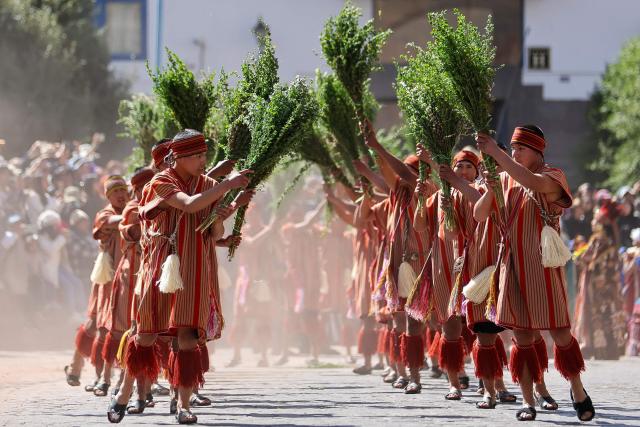 Actors perform a reenactment in front of the Inca temple of Coricancha during the Inti Raymi, a traditional Inca New Year and winter solstice celebration, in Cusco, Peru, on June 24, 2026. The Inti Raymi is the most important indigenous ceremony of the Peruvian Andes, held in honor of the god Inti (Quechua for "sun") at the beginning of the winter solstice. (Photo by Jose Angulo / AFP)