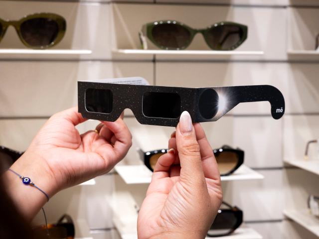 Eclipse viewing glasses certified with the ISO 12312-2:2015 international safety standard which specifies requirements for direct observation of the sun, are displayed at an optician's shop in Palma de Mallorca on June 25, 2026. According to Spain's National Astronomical Observatory, during the evening of Wednesday, August 12, 2026, a total solar eclipse will be visible from the Iberian Peninsula, marking the first such event in over a century. The path of totality of this eclipse will cross Spain from west to east and will pass throught numerous provincial capitals from La Coruna to Palma including Oviedo, Leon, Bilbao, Zaragoza, and Valencia. (Photo by Jaime REINA / AFP)