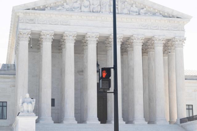 A view of the US Supreme Court in Washington, DC, on June 25, 2026. The US Supreme Court on Thursday backed a Trump administration move to strip deportation protections from some 350,000 Haitians and 6,000 Syrians living in the United States. The conservative-dominated court, in a 6-3 ruling, said the Department of Homeland Security's decision to end Temporary Protected Status (TPS) for Haitian and Syrian immigrants was not subject to judicial review. (Photo by SAUL LOEB / AFP)