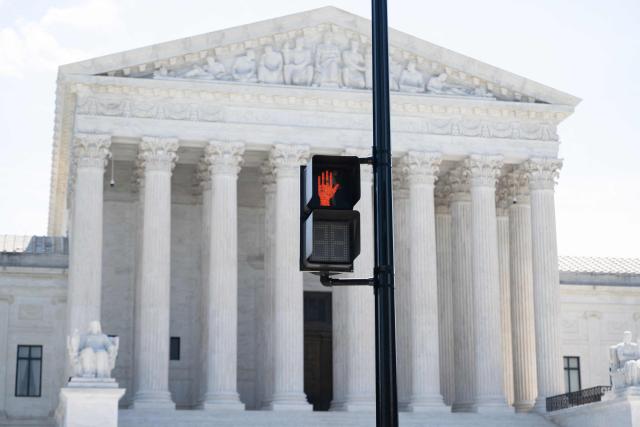 A view of the US Supreme Court in Washington, DC, on June 25, 2026. The US Supreme Court on Thursday backed a Trump administration move to strip deportation protections from some 350,000 Haitians and 6,000 Syrians living in the United States. The conservative-dominated court, in a 6-3 ruling, said the Department of Homeland Security's decision to end Temporary Protected Status (TPS) for Haitian and Syrian immigrants was not subject to judicial review. (Photo by SAUL LOEB / AFP)
