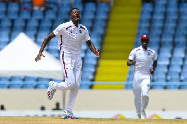 Alzarri Joseph (L) of West Indies celebrates the dismissal of Nishan Madushka of Sri Lanka during during the first Test cricket match between West Indies and Sri Lanka at Sir Vivian Richards Stadium in North Sound, Antigua and Barbuda, on June 25, 2026. (Photo by Randy Brooks / AFP)