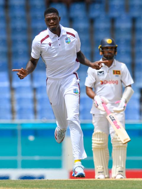 Alzarri Joseph (L) of West Indies celebrates the dismissal of Kamindu Mendis of Sri Lanka during during the first Test cricket match between West Indies and Sri Lanka at Sir Vivian Richards Stadium in North Sound, Antigua and Barbuda, on June 25, 2026. (Photo by Randy Brooks / AFP)