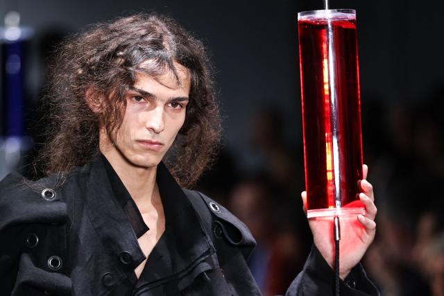 A model presents a creation by Yohji Yamamoto for the Menswear Spring/Summer 2027 collection fashion show as part of the Paris Fashion Week, in Paris, on June 25, 2026. (Photo by SIMON WOHLFAHRT / AFP)