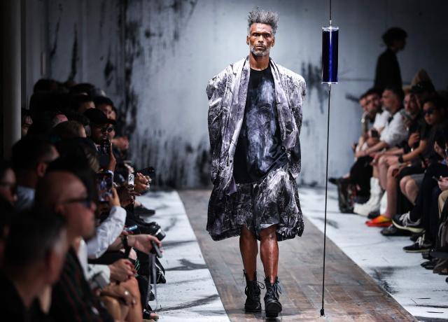 A model presents a creation by Yohji Yamamoto for the Menswear Spring/Summer 2027 collection fashion show as part of the Paris Fashion Week, in Paris, on June 25, 2026. (Photo by SIMON WOHLFAHRT / AFP)