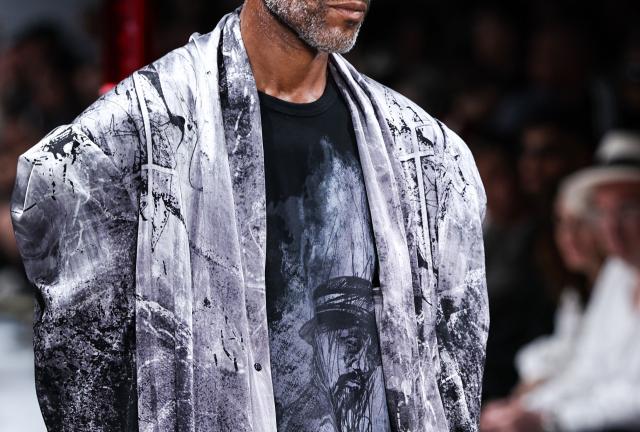 A model presents a creation by Yohji Yamamoto for the Menswear Spring/Summer 2027 collection fashion show as part of the Paris Fashion Week, in Paris, on June 25, 2026. (Photo by SIMON WOHLFAHRT / AFP)