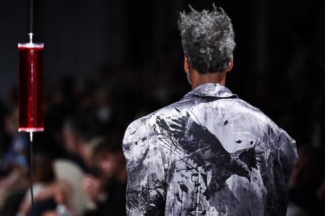A model presents a creation by Yohji Yamamoto for the Menswear Spring/Summer 2027 collection fashion show as part of the Paris Fashion Week, in Paris, on June 25, 2026. (Photo by SIMON WOHLFAHRT / AFP)