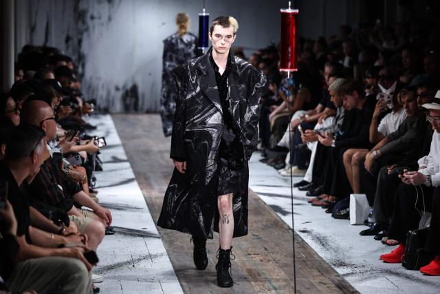 A model presents a creation by Yohji Yamamoto for the Menswear Spring/Summer 2027 collection fashion show as part of the Paris Fashion Week, in Paris, on June 25, 2026. (Photo by SIMON WOHLFAHRT / AFP)