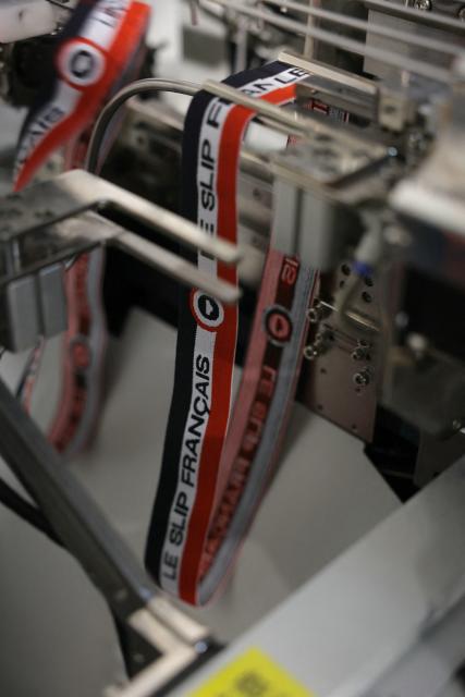 (FILES) This photograph shows a boxer briefs' elactic belt of 'Le Slip Francais' produced at the Bonne Nouvelle textile factory in Aubervilliers, surburb of Paris, on February 12, 2025. The underwear brand Le Slip français, one of the leaders of the "made in France" movement, announced on June 25, 2026 that it will go public on the symbolic date of July 14, hoping to raise 5 million euros in fresh capital. (Photo by Thomas SAMSON / AFP)
