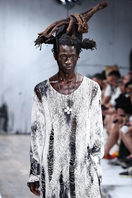 A model presents a creation by Yohji Yamamoto for the Menswear Spring/Summer 2027 collection fashion show as part of the Paris Fashion Week, in Paris, on June 25, 2026. (Photo by SIMON WOHLFAHRT / AFP)