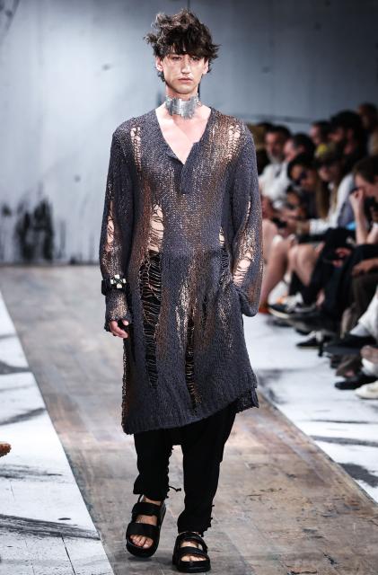 A model presents a creation by Yohji Yamamoto for the Menswear Spring/Summer 2027 collection fashion show as part of the Paris Fashion Week, in Paris, on June 25, 2026. (Photo by SIMON WOHLFAHRT / AFP)