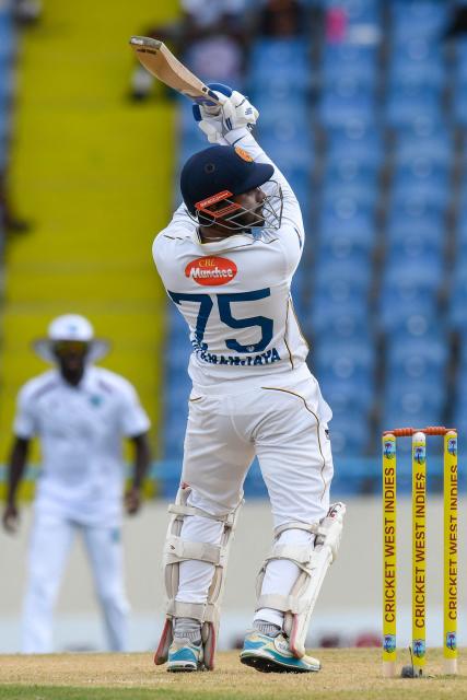 Dhananjaya de Silva of Sri Lanka hits 4 during the first Test cricket match between West Indies and Sri Lanka at Sir Vivian Richards Stadium in North Sound, Antigua and Barbuda, on June 25, 2026. (Photo by Randy Brooks / AFP)