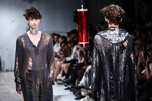 A model presents a creation by Yohji Yamamoto for the Menswear Spring/Summer 2027 collection fashion show as part of the Paris Fashion Week, in Paris, on June 25, 2026. (Photo by SIMON WOHLFAHRT / AFP)