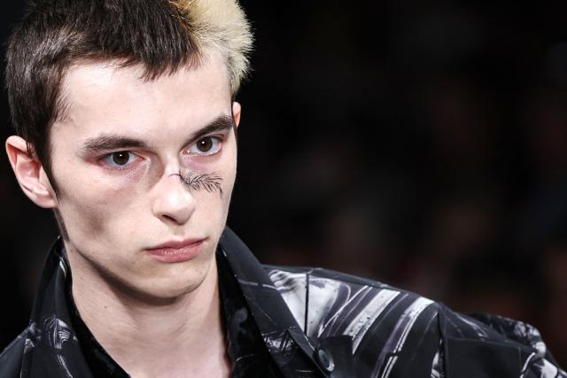 A model presents a creation by Yohji Yamamoto for the Menswear Spring/Summer 2027 collection fashion show as part of the Paris Fashion Week, in Paris, on June 25, 2026. (Photo by SIMON WOHLFAHRT / AFP)