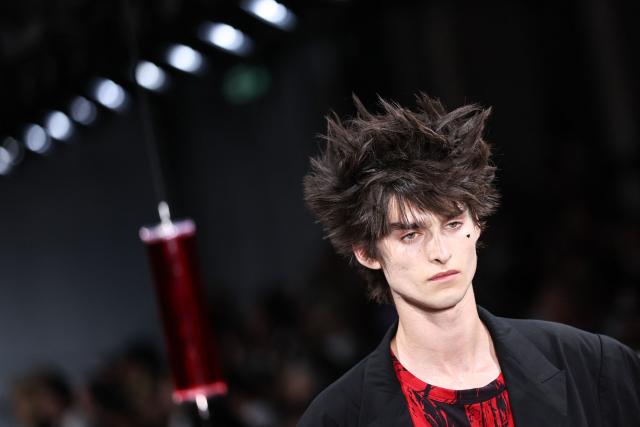 A model presents a creation by Yohji Yamamoto for the Menswear Spring/Summer 2027 collection fashion show as part of the Paris Fashion Week, in Paris, on June 25, 2026. (Photo by SIMON WOHLFAHRT / AFP)