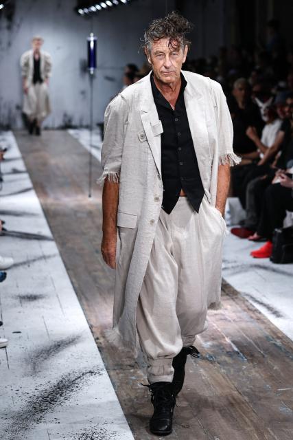 A model presents a creation by Yohji Yamamoto for the Menswear Spring/Summer 2027 collection fashion show as part of the Paris Fashion Week, in Paris, on June 25, 2026. (Photo by SIMON WOHLFAHRT / AFP)