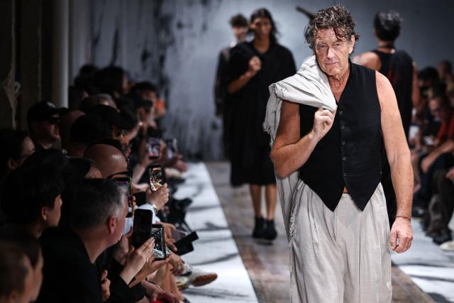 A model presents a creation by Yohji Yamamoto for the Menswear Spring/Summer 2027 collection fashion show as part of the Paris Fashion Week, in Paris, on June 25, 2026. (Photo by SIMON WOHLFAHRT / AFP)