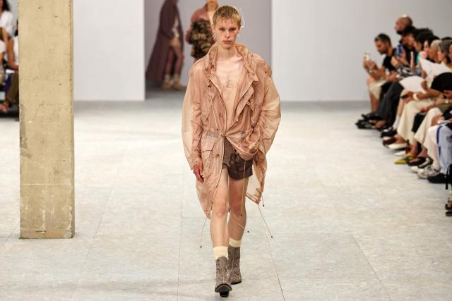 A model presents a creation for Dries Van Noten for the Menswear Spring/Summer 2027 collection fashion show as part of the Paris Fashion Week, in Paris on June 25, 2026. (Photo by SIMON WOHLFAHRT / AFP)