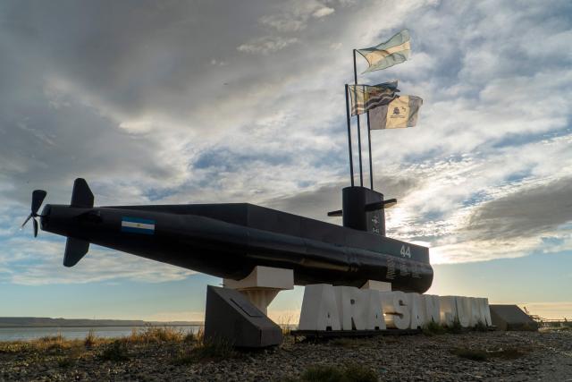 (FILES) A cenotaph bearing the names of the 44 members of the Argentine Navy who died during the sinking of the ARA San Juan submarine on November 15, 2017, is photographed in Río Gallegos, Santa Cruz province, Argentina on March 3, 2026, the day the trial of four former high-ranking Navy officers starts. The defense team for one of the former Argentine officers accused in connection with the 2017 submarine explosion requested his acquittal on June 25, 2026, arguing that there is no evidence that his actions led to the deaths of the 44 crew members. (Photo by WALTER DIAZ / AFP)