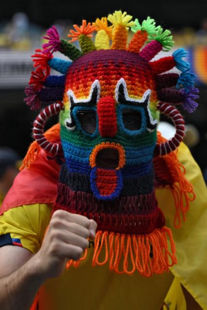 An Ecuadorian fan wearing an Aya Huma mask gestures ahead of the 2026 World Cup Group E football match between Ecuador and Germany at the New York/New Jersey Stadium in East Rutherford on June 25, 2026. (Photo by ANGELA WEISS / AFP)