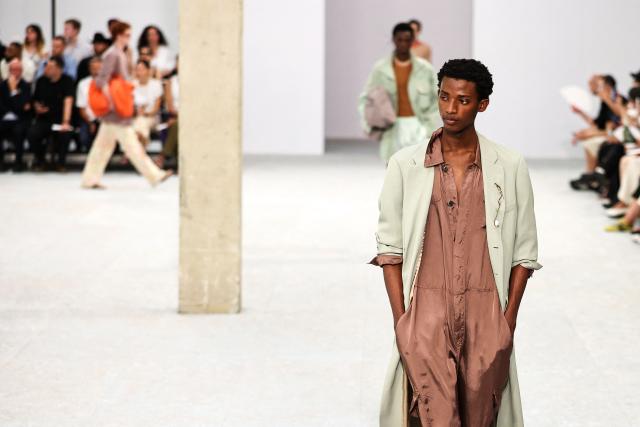 A model presents a creation for Dries Van Noten for the Menswear Spring/Summer 2027 collection fashion show as part of the Paris Fashion Week, in Paris on June 25, 2026. (Photo by SIMON WOHLFAHRT / AFP)