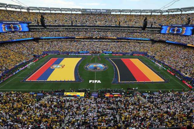 Ecuador and German players stand for the national anthem  ahead of the 2026 World Cup Group E football match between Ecuador and Germany at the New York/New Jersey Stadium in East Rutherford on June 25, 2026. (Photo by TIMOTHY A. CLARY / AFP)