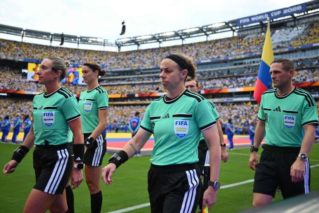 US referee Tori Penso (C) enters the pitch ahead of the 2026 World Cup Group E football match between Ecuador and Germany at the New York/New Jersey Stadium in East Rutherford on June 25, 2026. (Photo by ANGELA WEISS / AFP)
