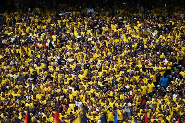 Ecuadorian fan sing the national anthem ahead of the 2026 World Cup Group E football match between Ecuador and Germany at the New York/New Jersey Stadium in East Rutherford on June 25, 2026. (Photo by Jewel SAMAD / AFP)