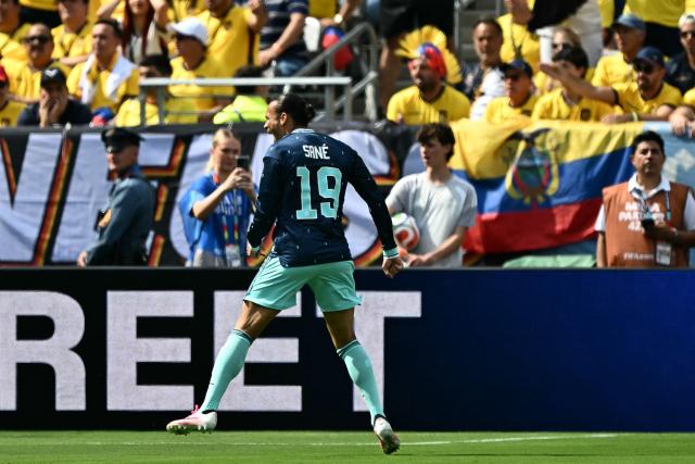 Germany's forward #19 Leroy Sane celebrates scoring his team's first goal during the 2026 World Cup Group E football match between Ecuador and Germany at the New York/New Jersey Stadium in East Rutherford on June 25, 2026. (Photo by Jewel SAMAD / AFP)