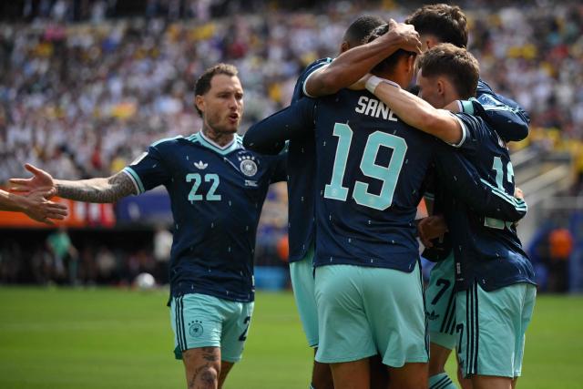 Germany's forward #19 Leroy Sane celebrates with teammates scoring his team's first goal during the 2026 World Cup Group E football match between Ecuador and Germany at the New York/New Jersey Stadium in East Rutherford on June 25, 2026. (Photo by ANGELA WEISS / AFP)