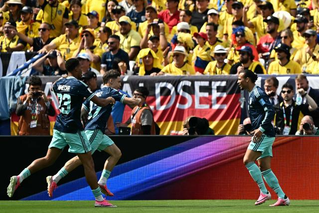 Germany's forward #19 Leroy Sane (R) celebrates scoring his team's first goal during the 2026 World Cup Group E football match between Ecuador and Germany at the New York/New Jersey Stadium in East Rutherford on June 25, 2026. (Photo by Jewel SAMAD / AFP)