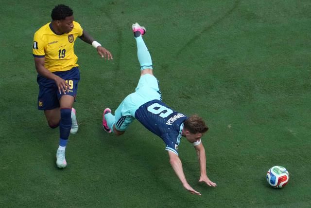 Ecuador's midfielder #19 Gonzalo Plata and Germany's defender #06 Joshua Kimmich fight for the ball during the 2026 World Cup Group E football match between Ecuador and Germany at the New York/New Jersey Stadium in East Rutherford on June 25, 2026. (Photo by TIMOTHY A. CLARY / AFP)