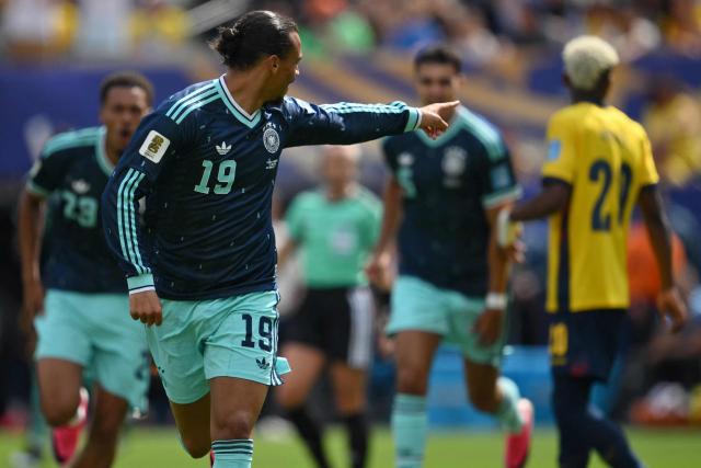 Germany's forward #19 Leroy Sane celebrates scoring his team's first goal during the 2026 World Cup Group E football match between Ecuador and Germany at the New York/New Jersey Stadium in East Rutherford on June 25, 2026. (Photo by ANGELA WEISS / AFP)