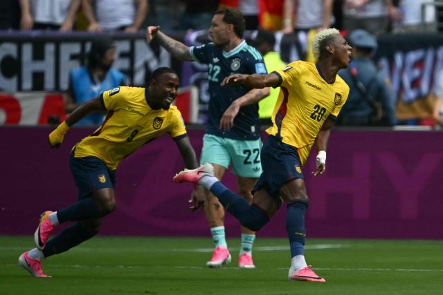 Ecuador's forward #20 Nilson Angulo celebrates next to teammate midfielder #09 John Yeboah scoring his team's first goal during the 2026 World Cup Group E football match between Ecuador and Germany at the New York/New Jersey Stadium in East Rutherford on June 25, 2026. (Photo by MAURO PIMENTEL / AFP)