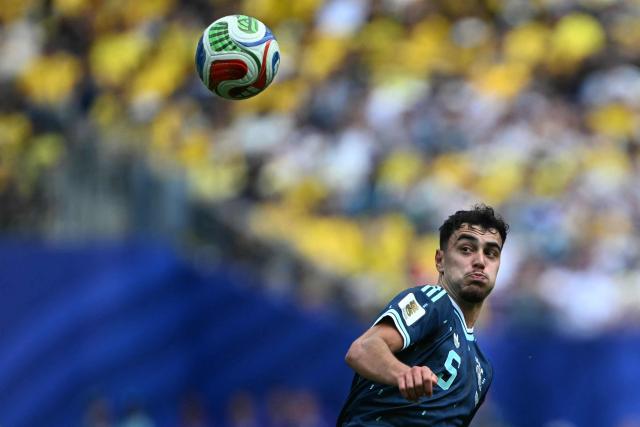 Germany's defender #05 Aleksandar Pavlovic eyes the ball during the 2026 World Cup Group E football match between Ecuador and Germany at the New York/New Jersey Stadium in East Rutherford on June 25, 2026. (Photo by MAURO PIMENTEL / AFP)