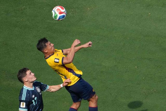 Germany's midfielder #17 Florian Wirtz and Ecuador's midfielder #21 Alan Franco fight for the ball during the 2026 World Cup Group E football match between Ecuador and Germany at the New York/New Jersey Stadium in East Rutherford on June 25, 2026. (Photo by TIMOTHY A. CLARY / AFP)