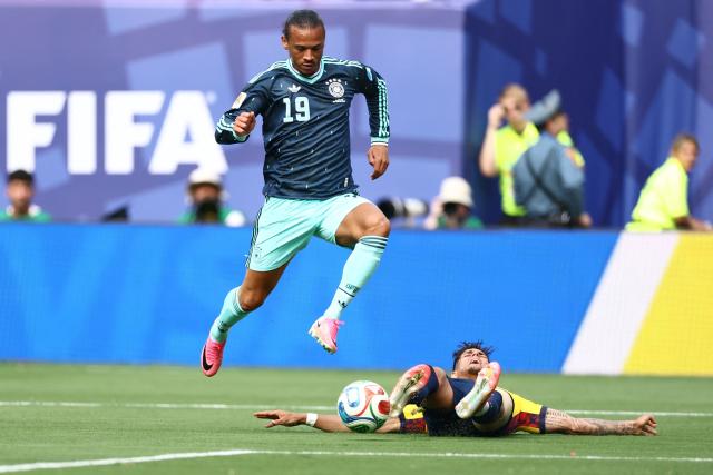 Germany's forward #19 Leroy Sane and Ecuador's defender #03 Piero Hincapie fight for the ball during the 2026 World Cup Group E football match between Ecuador and Germany at the New York/New Jersey Stadium in East Rutherford on June 25, 2026. (Photo by CHARLY TRIBALLEAU / AFP)