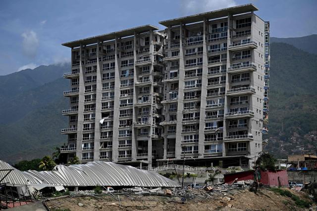 View of a damaged building following a twin earthquake in Los Corales, La Guaira state, about 38 km northwest of Caracas, on June 25, 2026. The death toll from twin quakes, measured at magnitudes 7.2 and 7.5, has risen to at least 188, with more than 1,520 others injured, top lawmaker Jorge Rodriguez reported, while residents continue searching for missing relatives. (Photo by Federico PARRA / AFP)