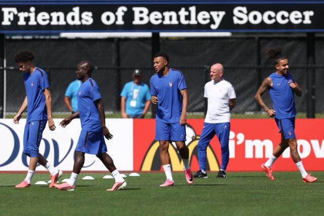 France's forward #10 Kylian Mbappe (C) walks on the pitch during a training session on the eve of France's 2026 World Cup football tournament Group I football match against Norway at Bentley University in Boston on June 25, 2026.  (Photo by FRANCK FIFE / AFP)