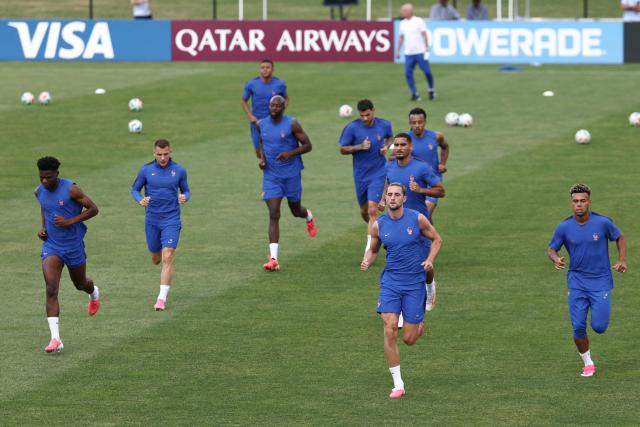 France players jog during a training session on the eve of France's 2026 World Cup football tournament Group I football match against Norway at Bentley University in Boston on June 25, 2026.  (Photo by FRANCK FIFE / AFP)