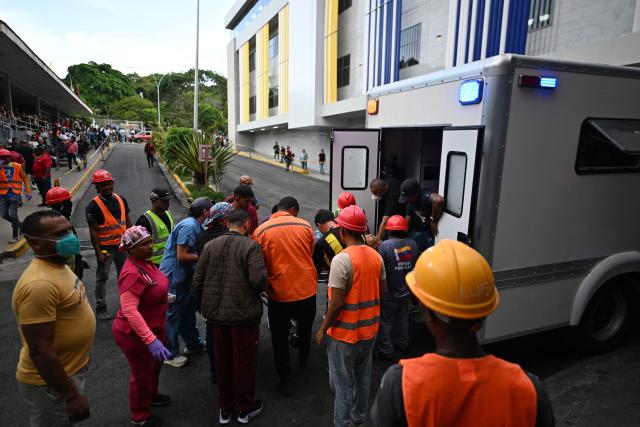A victim of the twin earthquake is admitted at the Domingo Luciani hospital in Caracas, on June 25, 2026. The death toll from twin quakes, measured at magnitudes 7.2 and 7.5, has risen to at least 188, with more than 1,520 others injured, top lawmaker Jorge Rodriguez reported, while residents continue searching for missing relatives. (Photo by Juan BARRETO / AFP)