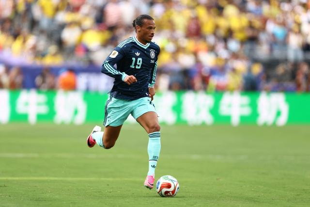 Germany's forward #19 Leroy Sane runs with the ball during the 2026 World Cup Group E football match between Ecuador and Germany at the New York/New Jersey Stadium in East Rutherford on June 25, 2026. (Photo by CHARLY TRIBALLEAU / AFP)