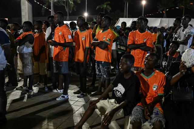 Ivory Coast's National Football team supporters gather to watch the 2026 FIFA World Cup football tournament match between Ivory Coast and Curacao at the Place de la Mairie in Abobo, suburb of Abidjan on June 25, 2026. (Photo by Issouf SANOGO / AFP)