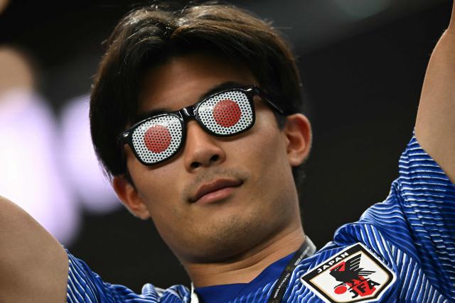 Japan's fan cheers for his team ahead of the 2026 World Cup Group F football match between Japan and Sweden at the Dallas Stadium in Arlington on June 25, 2026. (Photo by Paul ELLIS / AFP)