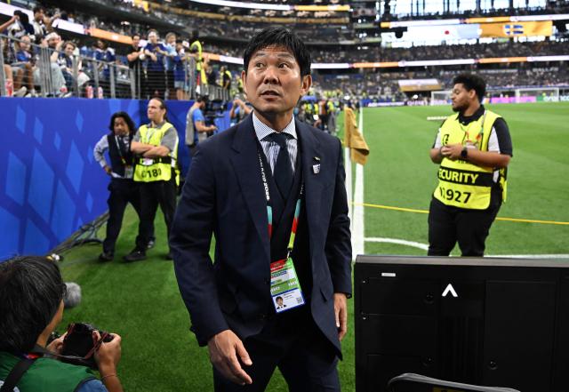 Japan's head coach Hajime Moriyasu looks at the stands ahead of the 2026 World Cup Group F football match between Japan and Sweden at the Dallas Stadium in Arlington on June 25, 2026. (Photo by Paul ELLIS / AFP)